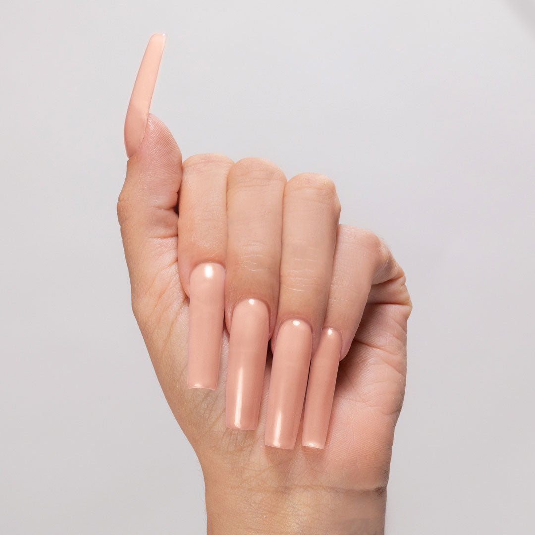 My BFF acrylic powder applied to light-skinned hand