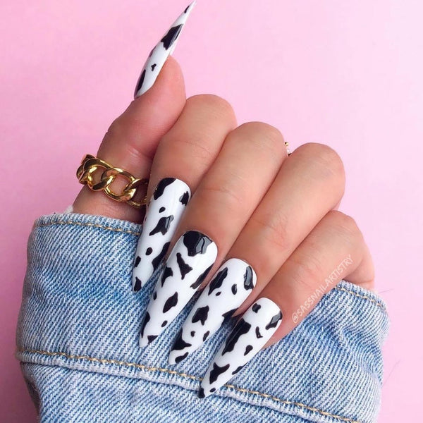 cow print black and white nails
