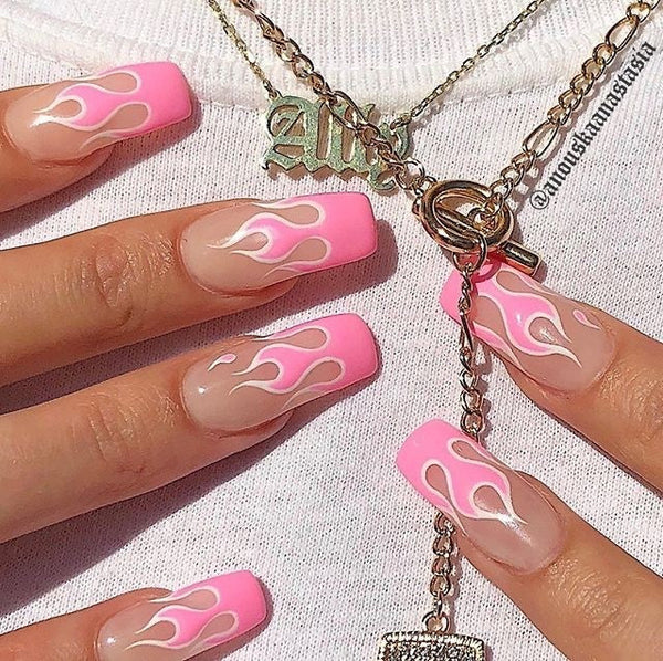 https://kiarasky.com/cdn/shop/articles/pink_and_white_flame_nails_grande.jpg?v=1625180241