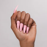 Pink Escape acrylic powder applied to dark-skinned hand