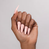 Just My Luck cover acrylic powder applied to dark-skinned hand