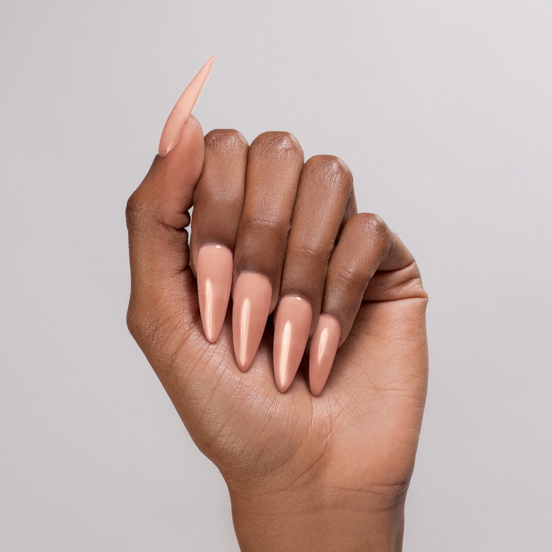 My BFF acrylic powder applied to dark-skinned hand