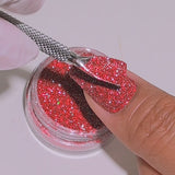 Ruby Stardust glitter applied to nails