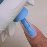 Kiara Sky Gel Pro HFG074 Muted Blue applied to nail