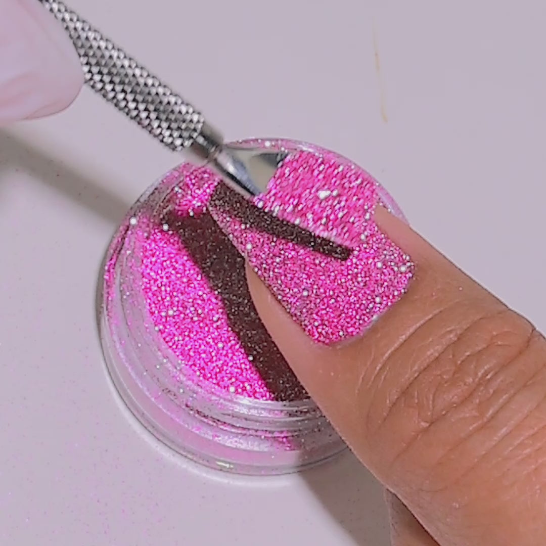 Flirty Flamingo glitter applied to nails