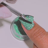 Sparkling Mojito glitter applied to nails