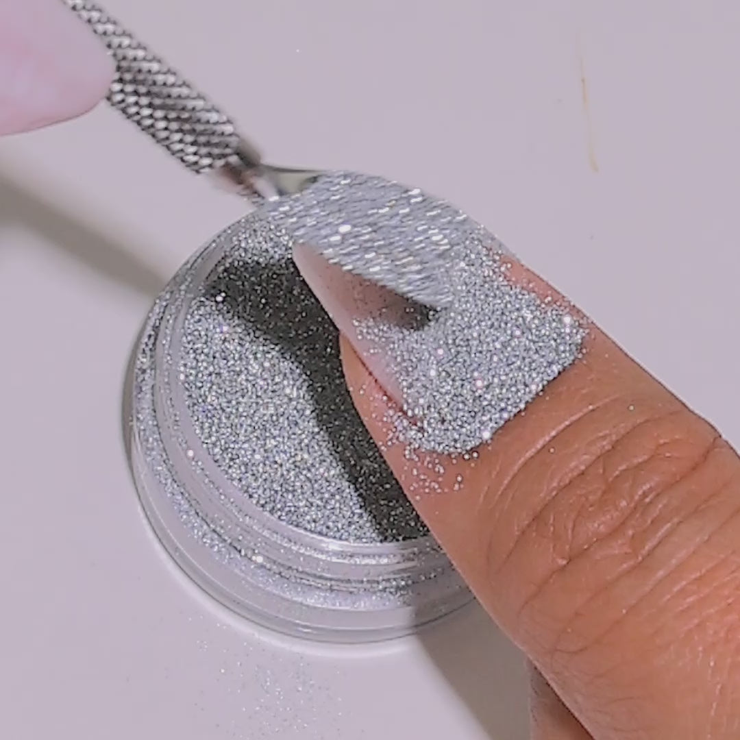 Iced Out glitter applied to nails