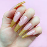 Gold Exhibit gel art bottle applied to nail extension tips