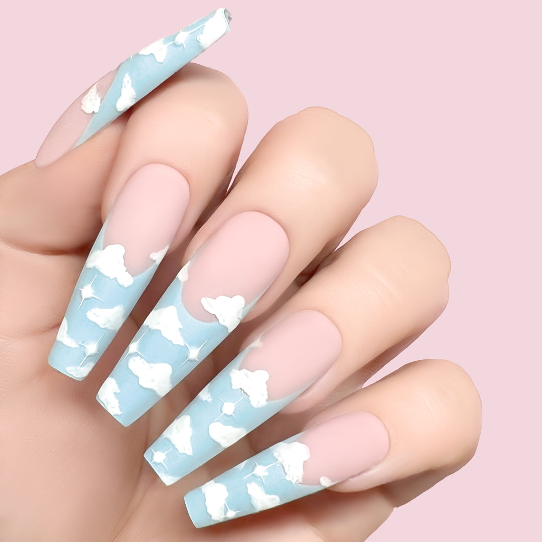 Take a Tint gel art applied to nail extensions with cloud design