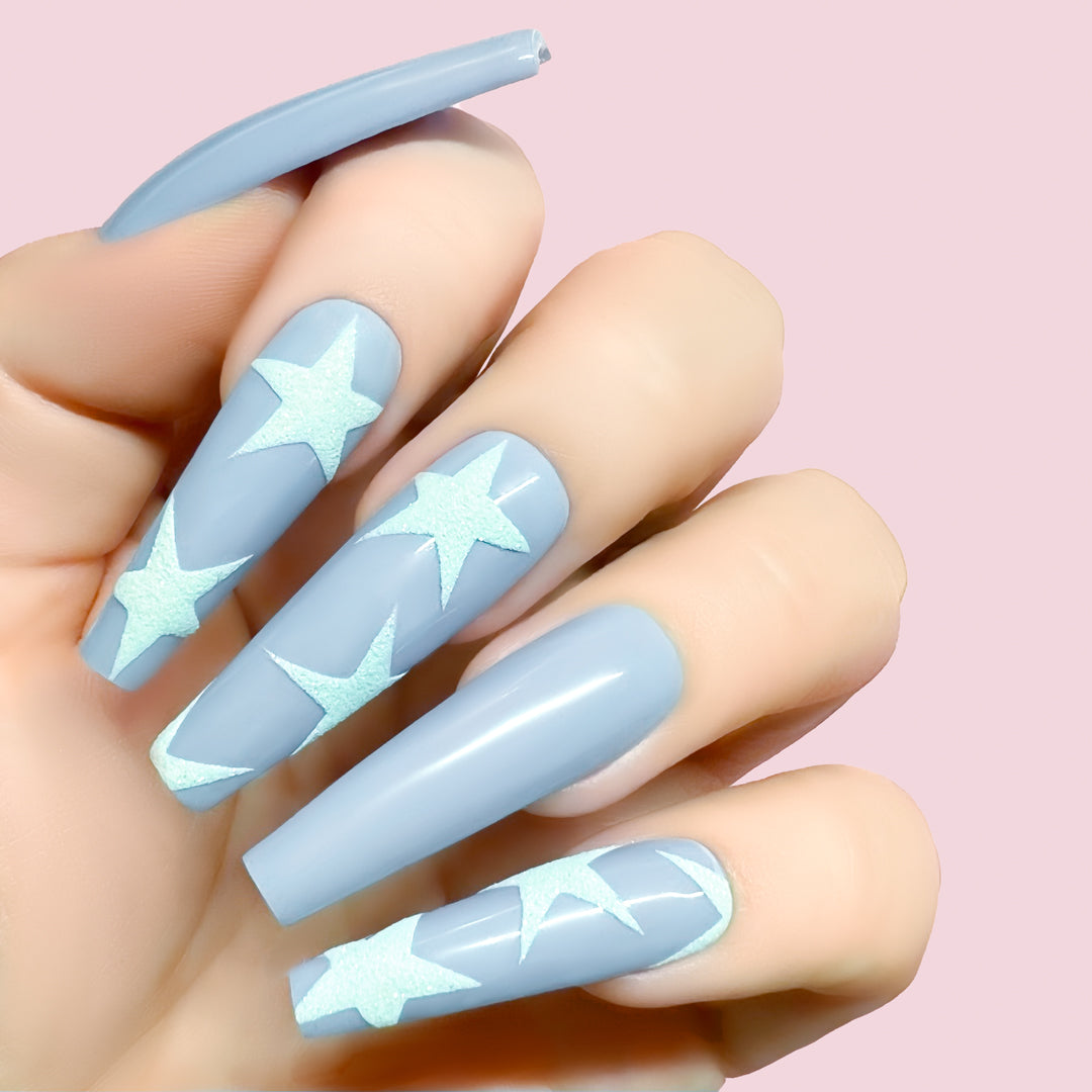 Take a Tint gel art applied to nail extensions with star design