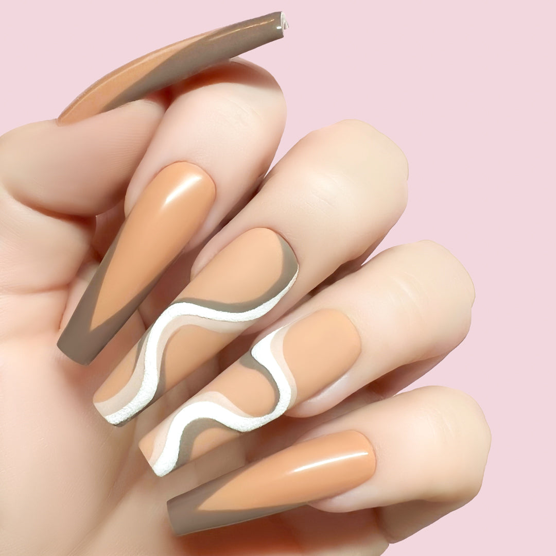 Oh My Gaudi gel art applied to nail extensions with swirly design