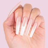 Boujee Beige cover acrylic powder applied to nail extensions
