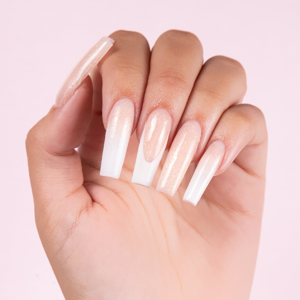 Inner Glow cover acrylic powder applied to nail extensions