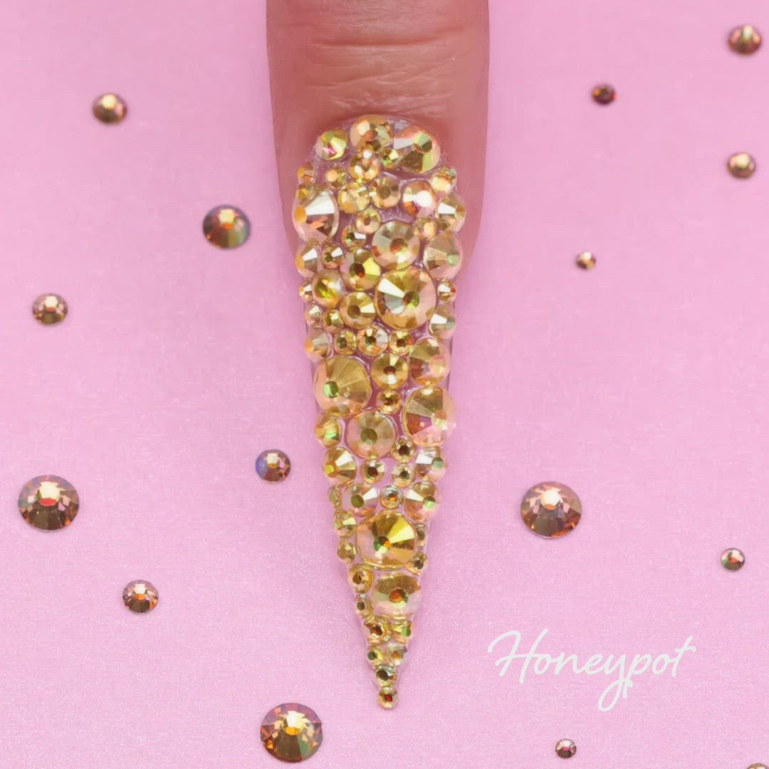 Kiara Sky Honey Pot Rhinstones on nail