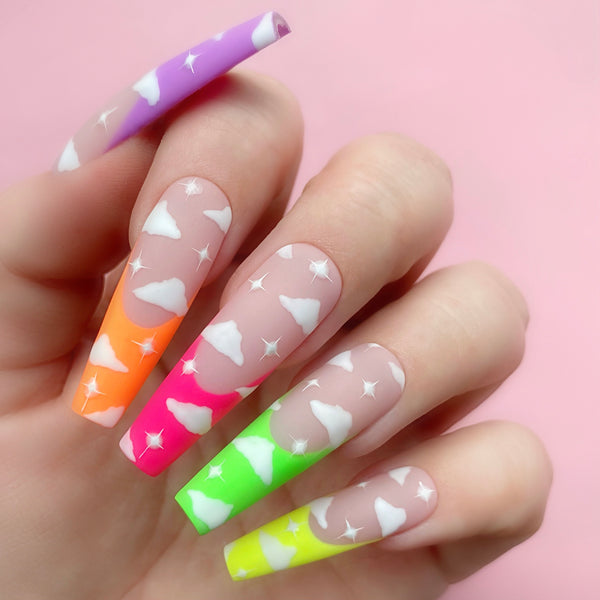 Self Portrait gel art applied to nail extensions with cloud design
