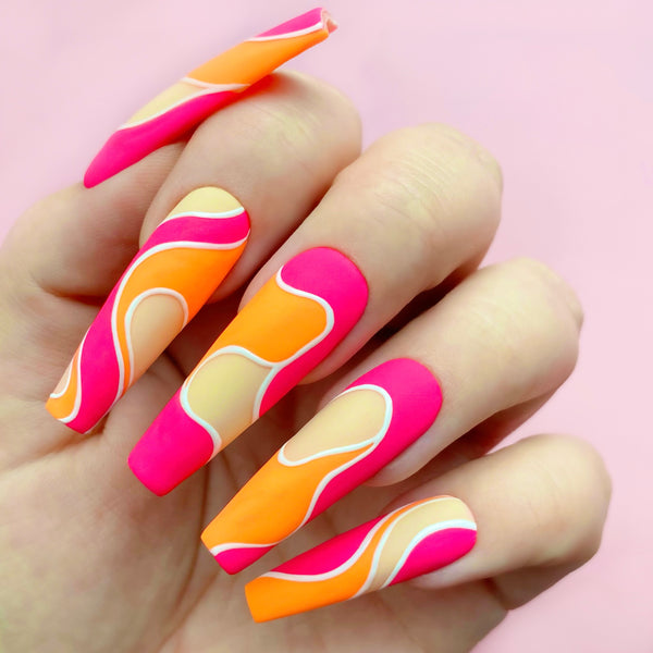 Creative Outlet get art applied to wavy swirly design nail extensions