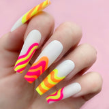 Self Portrait gel art applied to nail extensions with wavy design